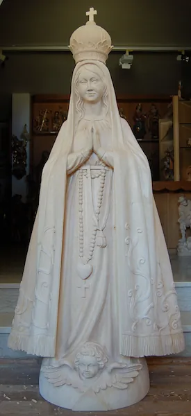 Wooden sculpture of the Black Madonna before painting