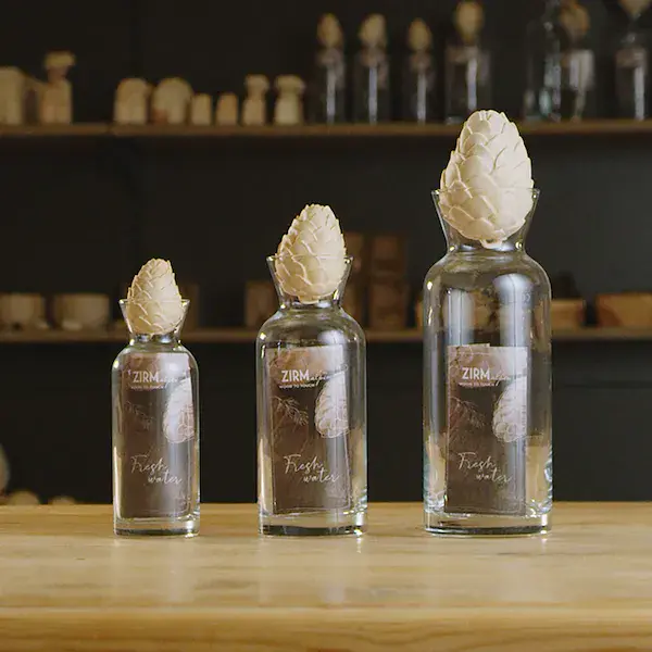 Carafe with Swiss pine cone