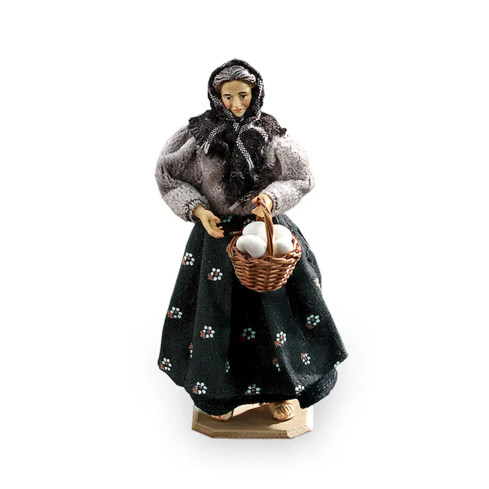 Grandmother with basket with eggs