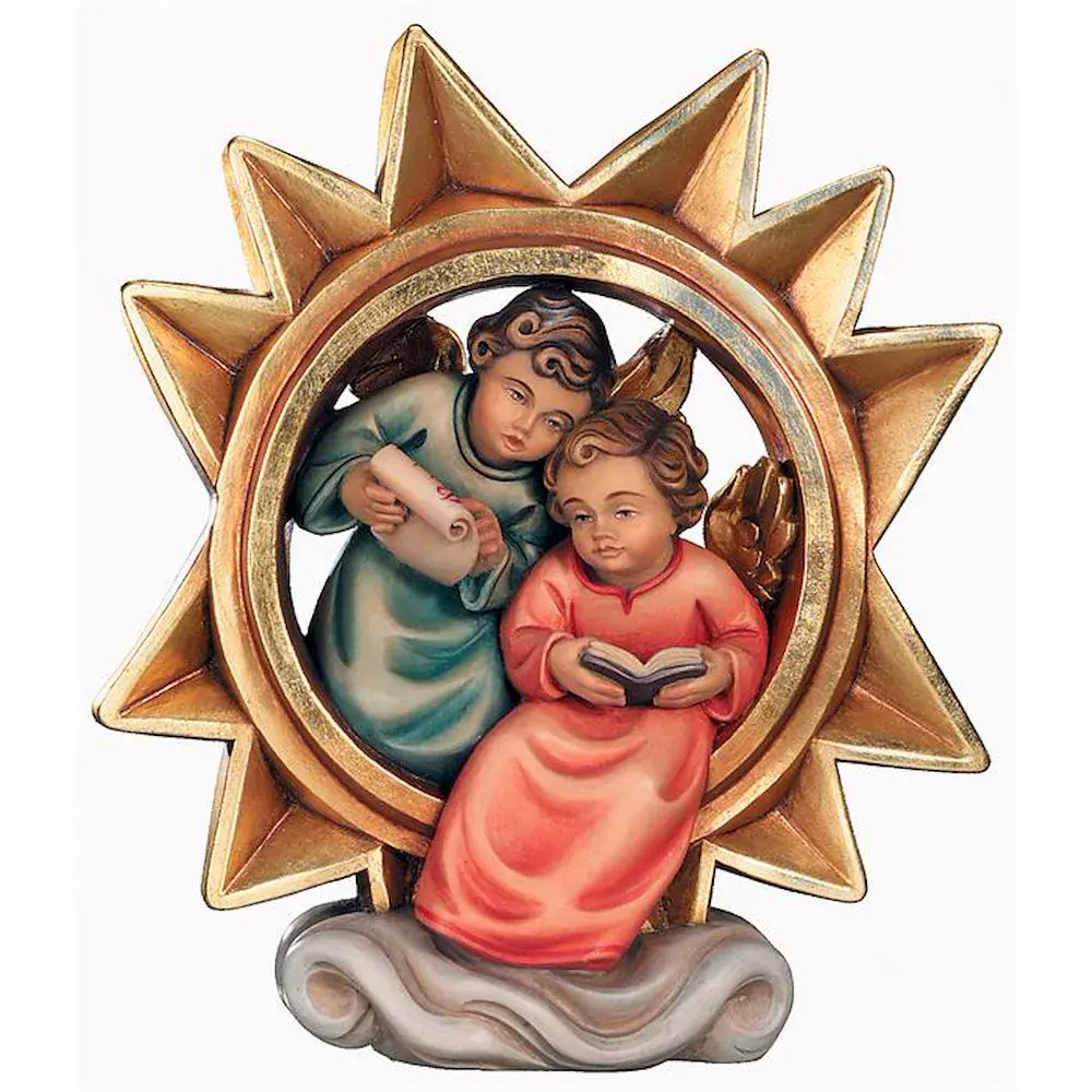 Estrella con dos angelitos cantando