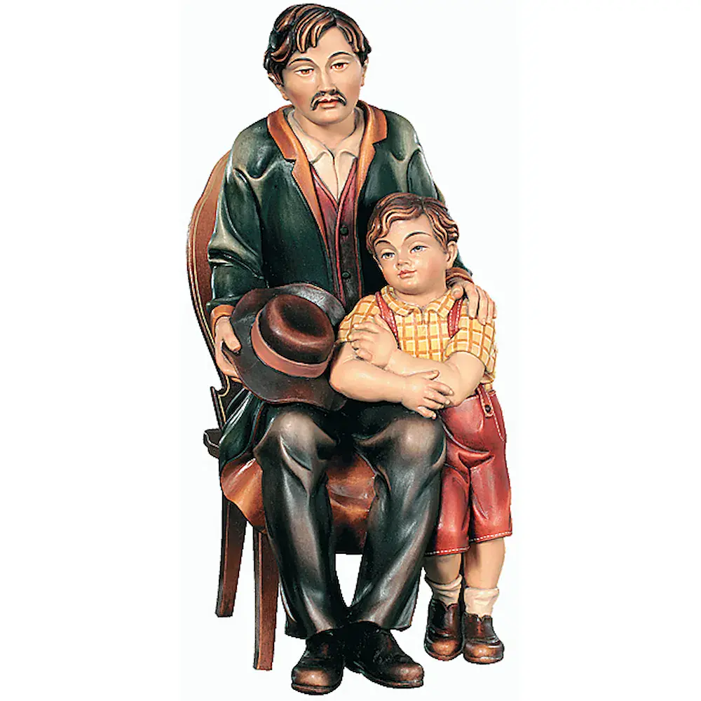 Padre sentado en una silla con un niño