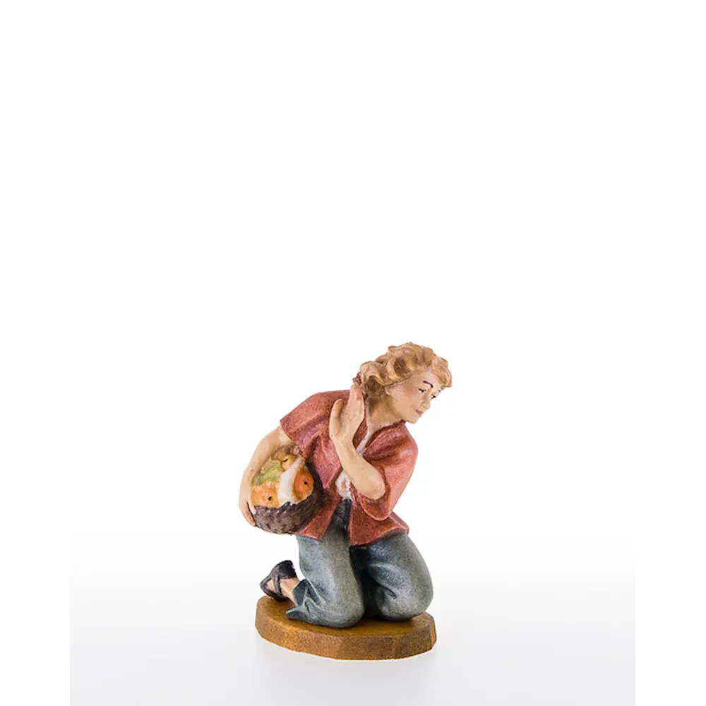 Child kneeling with fruit-basket