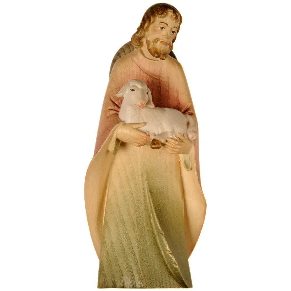 Shepherd standing with sheep