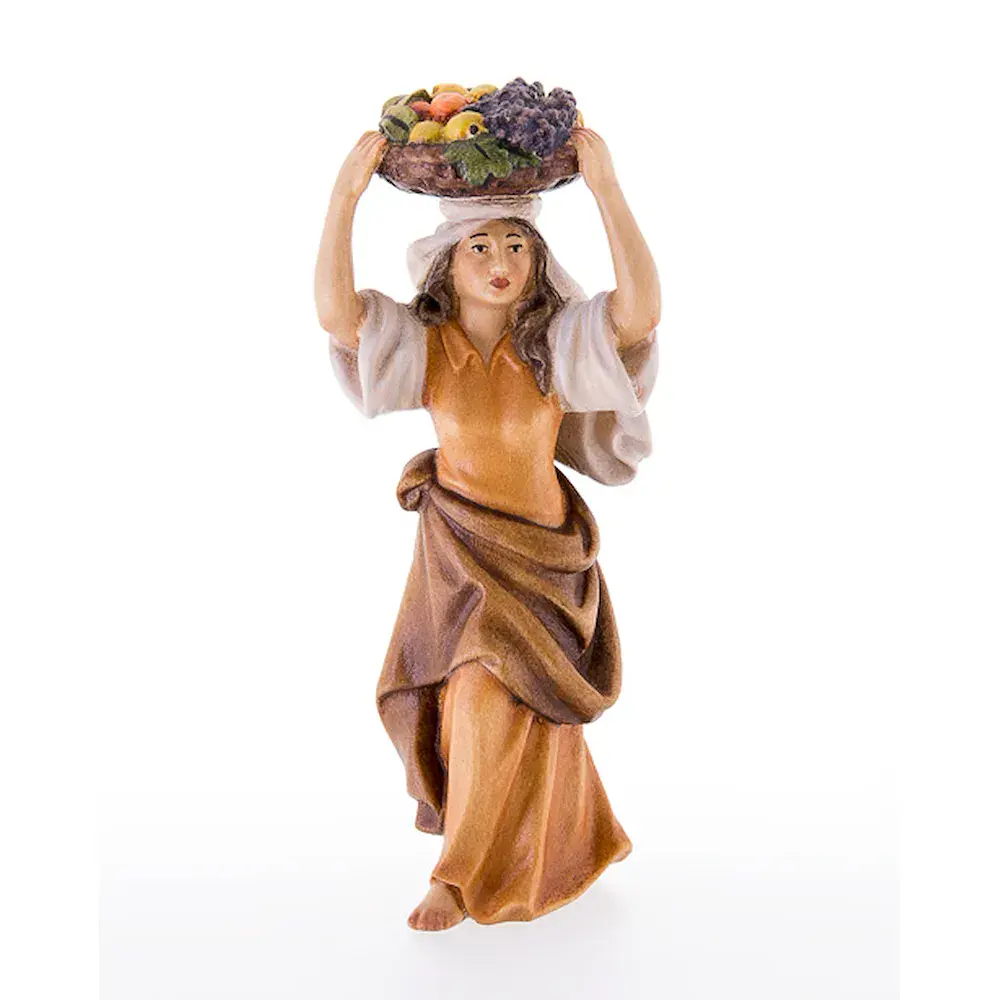 Mujer con la cesta de fruta