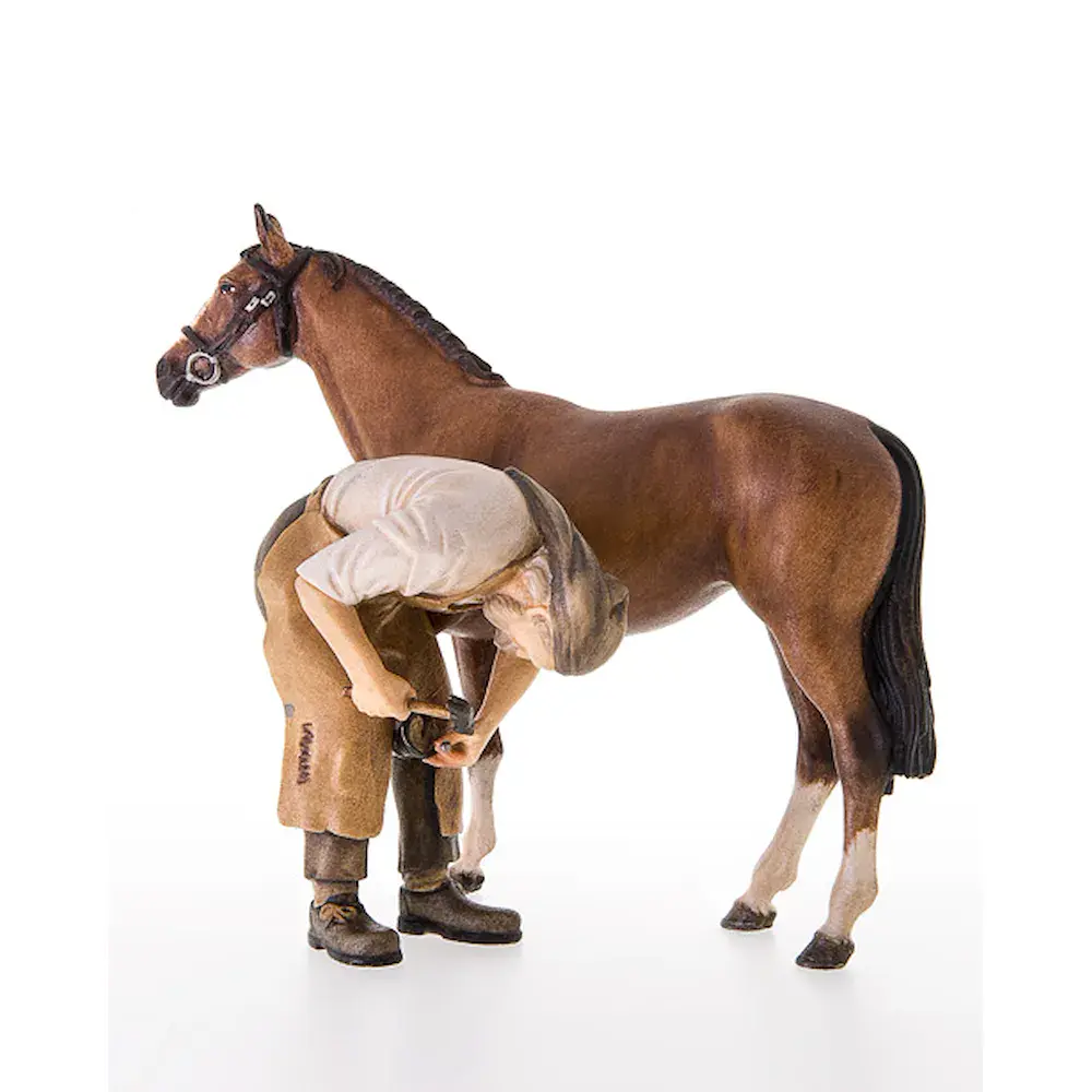 Herrero con caballo