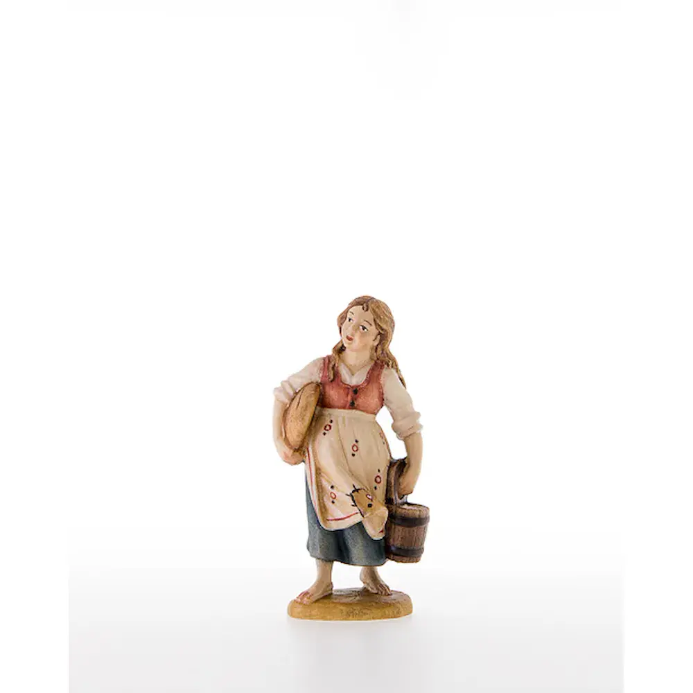 Bambina con pane e secchio