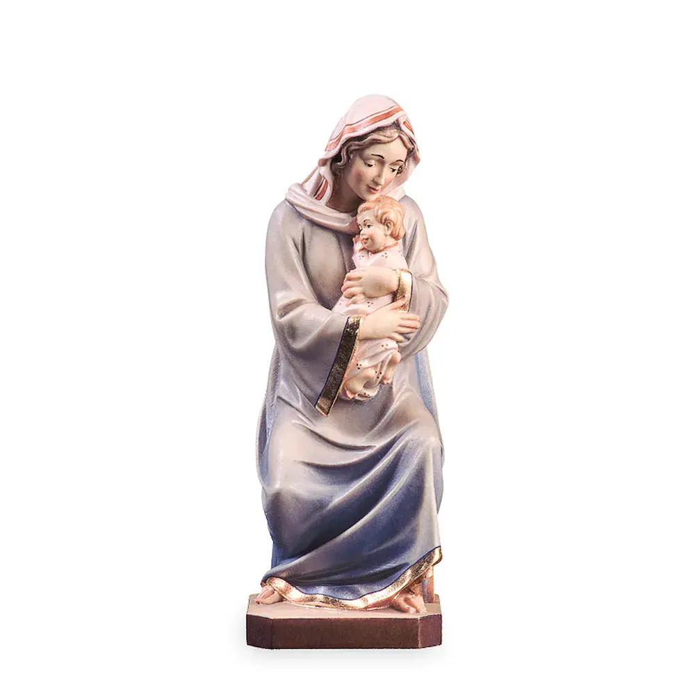 Virgen que se sienta
