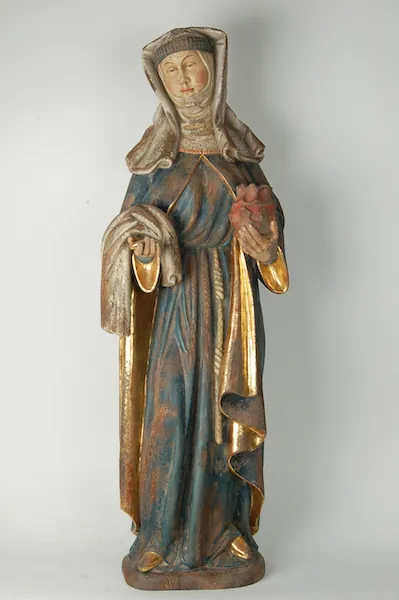 After painting and decorating with real gold leaf